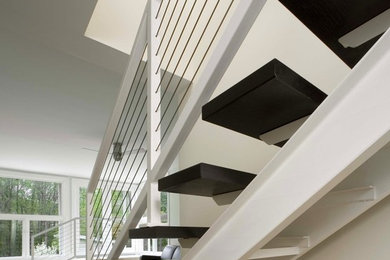 Inspiration for a modern straight staircase remodel in Las Vegas