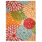 Nourison - Nourison Aloha ALH05 Green 7'10" x 10'6" Area Rug - This outdoor rug from the Aloha Collection features soft cut pile and textural woven patterns in bursts of brilliant color sure to liven any outdoor space. Oversized floral patterns in red, blue, orange, green, and camel add a festive touch of the tropics to your patio or deck. Created from premium stain-resistant fibers for long wear, low maintenance, and a splendid texture.