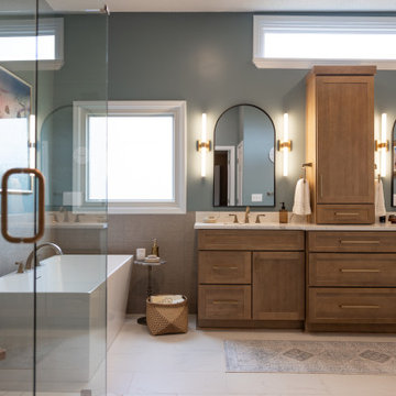 Spa Like Primary Bathroom Remodel with Warm Wood & Brass Details