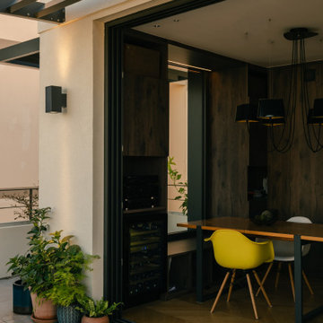 Salle à manger ouverte sur la terrasse