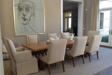 Inspiration for a mid-sized transitional ceramic tile kitchen/dining room combo remodel in Phoenix with beige walls