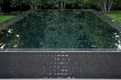 Inspiration for a contemporary pool remodel in Omaha