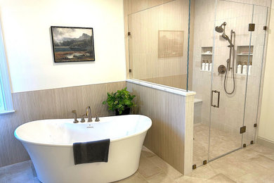 Example of a large transitional master ceramic tile ceramic tile and double-sink bathroom design in DC Metro with an undermount sink, a hinged shower door and a built-in vanity