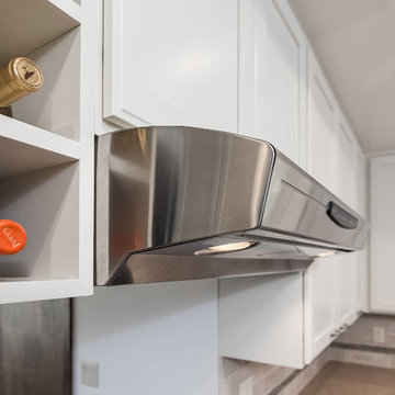 Built In Wine Bottle Storage in White Kitchen