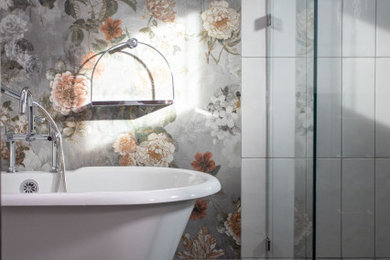 Example of a mid-sized classic master multicolored tile and porcelain tile porcelain tile and gray floor bathroom design in Minneapolis with white walls, a drop-in sink and a hinged shower door