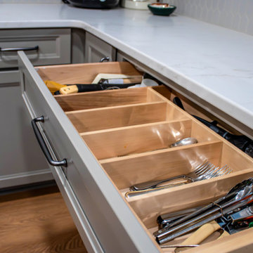 Two-Tone Neutral Kitchen with Quartz Countertop and Soho Picket Backsplash