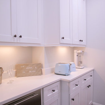 White Beverage Center with Soft Blue Accents