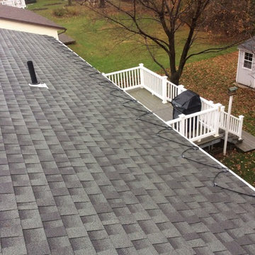 120 volt Raychem ice cables over leaf guard style gutters.