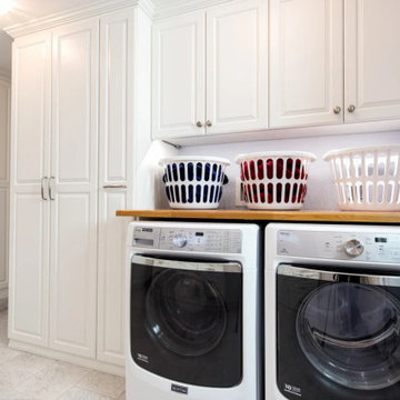 Custom Laundry Room with Pull-Out Storage Cabinet
