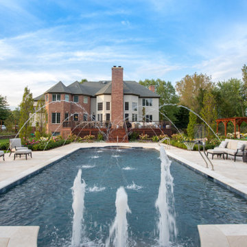 Barrington Hills, IL Scalloped Edge Pool with Round Hot Tub and Sunshelf