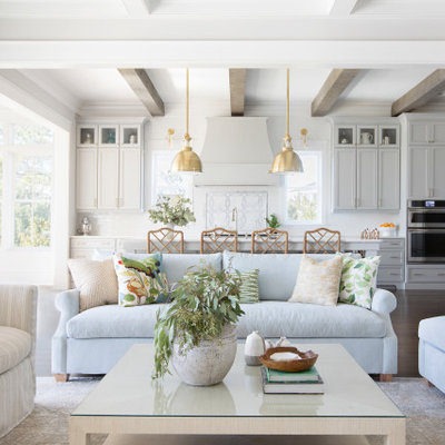 Example of a beach style home design design in Charleston