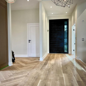 HERRINGBONE HARDWOOD FLOOR PROJECT IN LAKE IN THE HILLS, ILLINOIS.