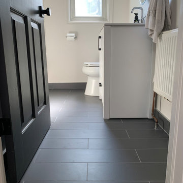 Plank tile Flooring and Penny tile Backsplash