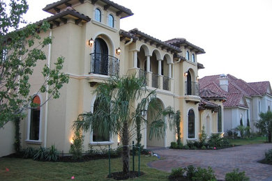 Inspiration for a mediterranean exterior home remodel in Dallas