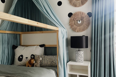 Example of a minimalist kids' room design in Toronto