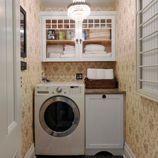 Photo of a small victorian single-wall separated utility room in New York with shaker cabinets, granite worktops, porcelain flooring, beige walls and white cabinets.