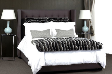 Inspiration for a mid-sized transitional carpeted bedroom remodel in Other with gray walls