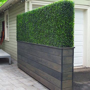 Patio Space with boxwood hedge and planter