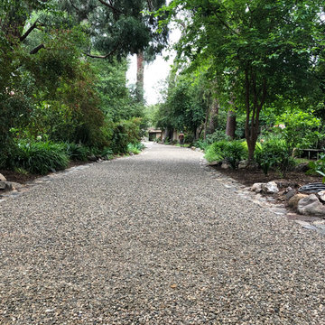 Cracked Concrete, converted to a Stabilized & Eco-Friendly Gravel Driveway..