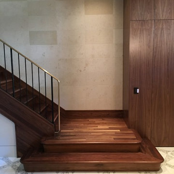 Walnut Stairs with Bronze Handrail and Iron Balusters