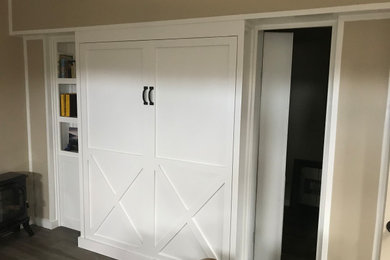 Arts and crafts living room photo in Other