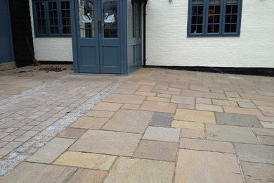 This is an example of a traditional front patio with natural stone paving.