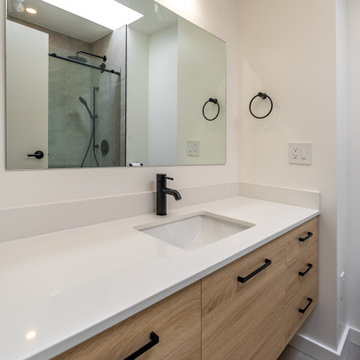 Quartz Countertop Vanity with Matte Black Fixtures – Modern Bathroom Renovation