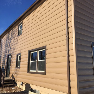 Steel Log Siding installed in Berthoud, CO