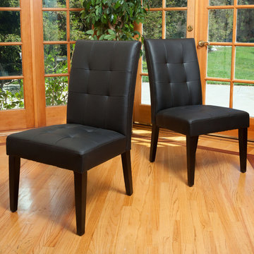 Contemporary Living Space With Black Leather Dining Chairs
