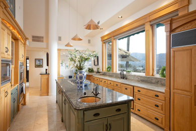 Example of a tuscan kitchen design in Los Angeles