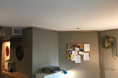 Urban family room photo in Other