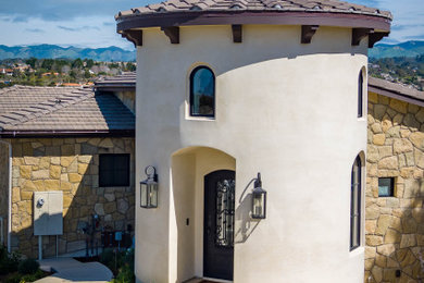 Example of a tuscan exterior home design in San Luis Obispo