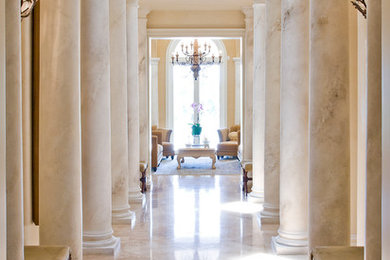This is an example of a mediterranean hallway in Other with beige walls.