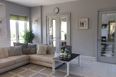 Family room - contemporary family room idea in Other