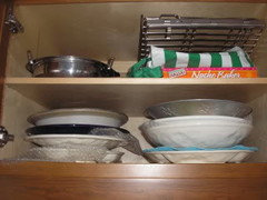 Please show me where you store your large serving bowls - Kitchens