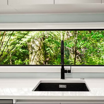 Window as splash-back - bringing the outside in by framing the view
