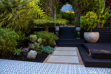 Inspiration for a tropical exterior home remodel in San Francisco