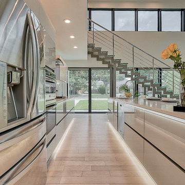 Modern kitchen cabinets with Glass facades in North Dallas