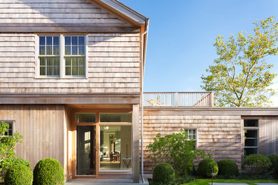Example of a transitional front door design in New York