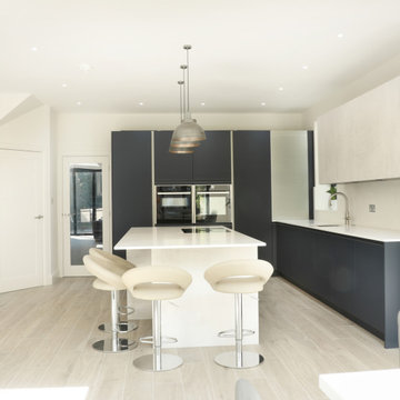 Pronorm Handless in Midnight Blue & Oxide concrete with Cimstone Cortina worktop