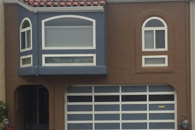 Inspiration for a timeless multicolored two-story stucco exterior home remodel in San Francisco
