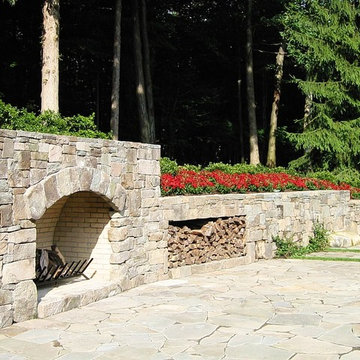 Pool Stone Hearth and Surrounding Gardens
