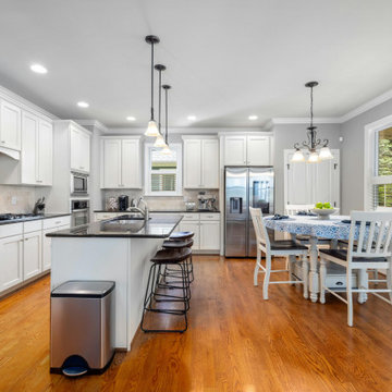 Everyday Elegance: White Kitchen with Casual Dining Nook