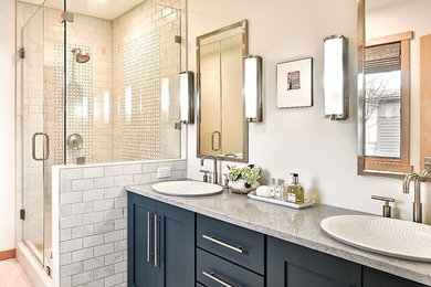 Mid-sized transitional master bathroom in Other with shaker cabinets, blue cabinets, marble, a vessel sink, grey floor, a hinged shower door, an alcove shower, white tile, ceramic floors, engineered quartz benchtops and grey benchtops.