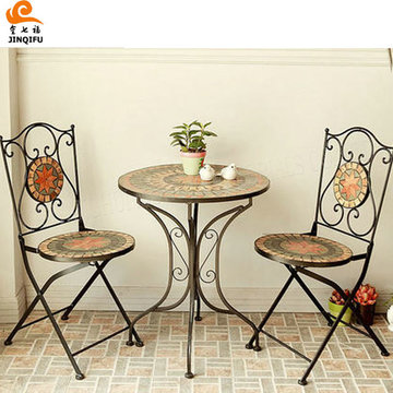 wrought iron table and chairs