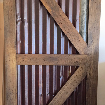 Rustic Distressed Arrow Sliding Barn Door with Recycled Tin Accents