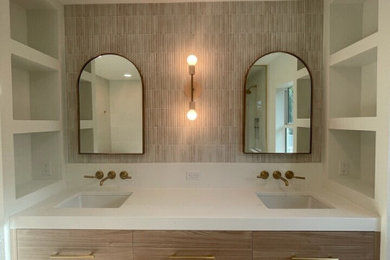 Bathroom - contemporary master white tile porcelain tile and double-sink bathroom idea in Tampa with light wood cabinets, an undermount sink and a floating vanity