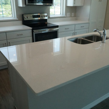White Kitchen with Matching White Quartz Countertops