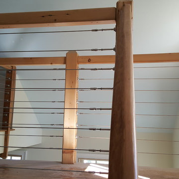 reclaimed wood child's loft entrance with wire cables