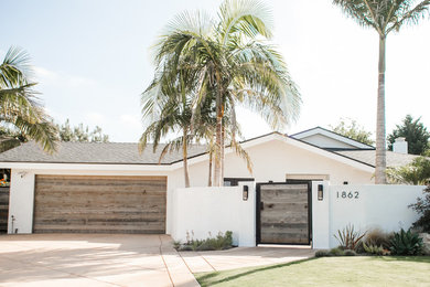 Inspiration for a coastal exterior home remodel in Orange County